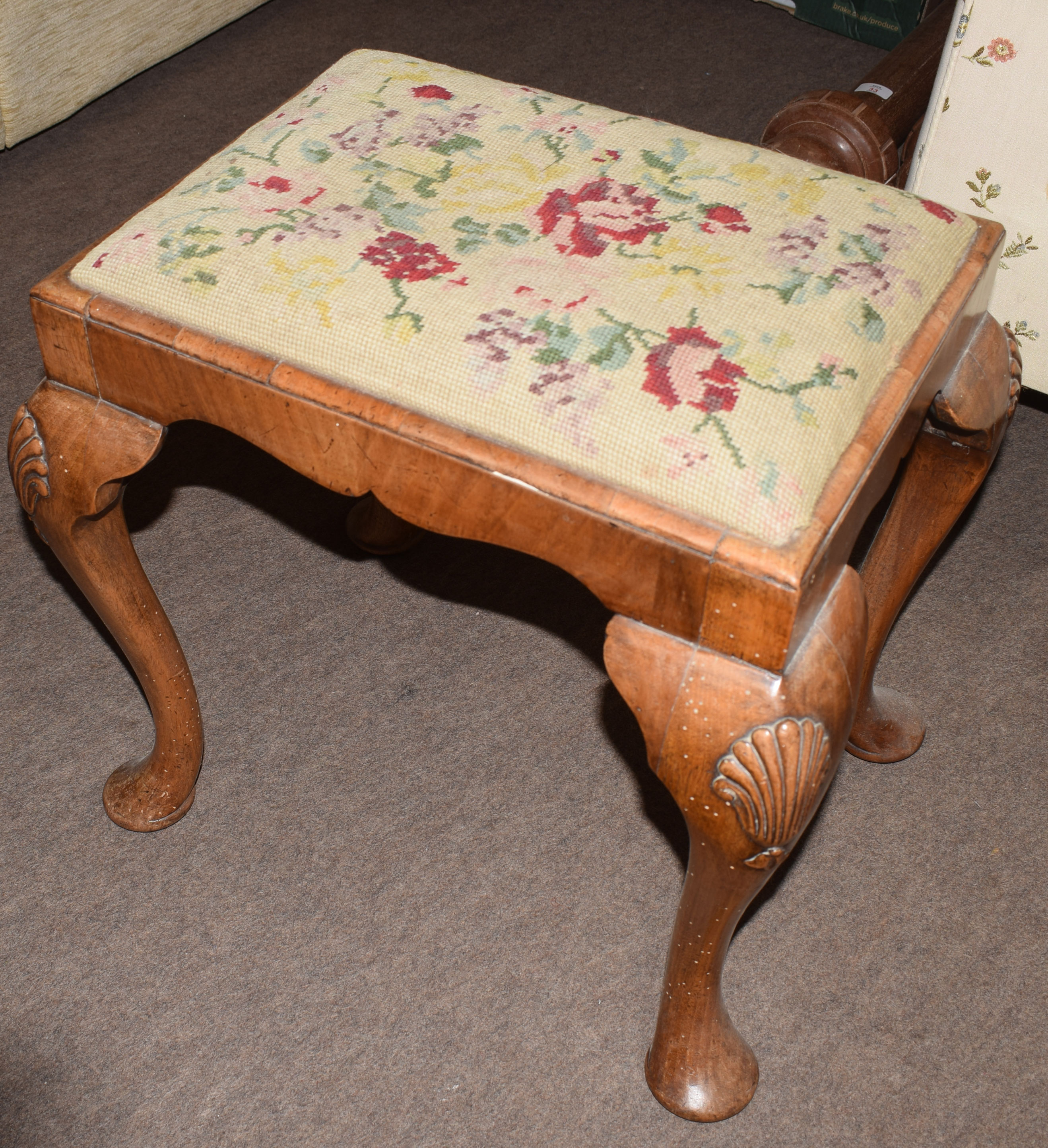 Group of three stools, the first: Queen Anne style in walnut on four shell carved cabriole legs with