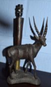 Mid-20th century carved hardwood gazelle mounted table lamp, 16cm wide x 37cm tall