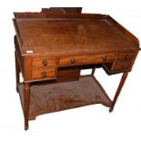 Early 19th century small mahogany wash stand with galleried surround to top, having two, one and two