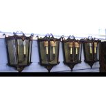 Set of four mid/late 20th century carriage style painted metal and glass wall lights with
