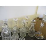 SELECTION OF EIGHT VARIOUS DECANTERS INC TWO SHIP’S DECANTERS, TALLEST INC STOPPER APPROX 32CM