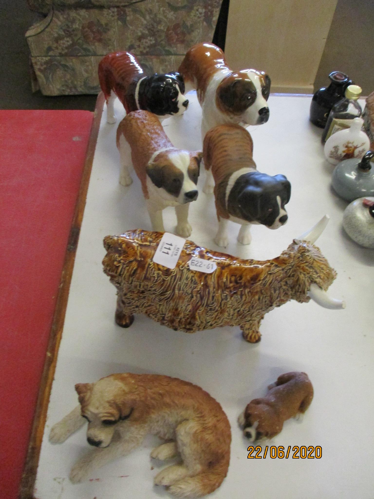 COLLECTION OF DOG AND COW FIGURES