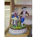 CONTINENTAL PORCELAIN GROUP OF LADY AND GENTLEMAN ON AN OVAL BASE WITH IMPRESSED NUMERALS TO BASE