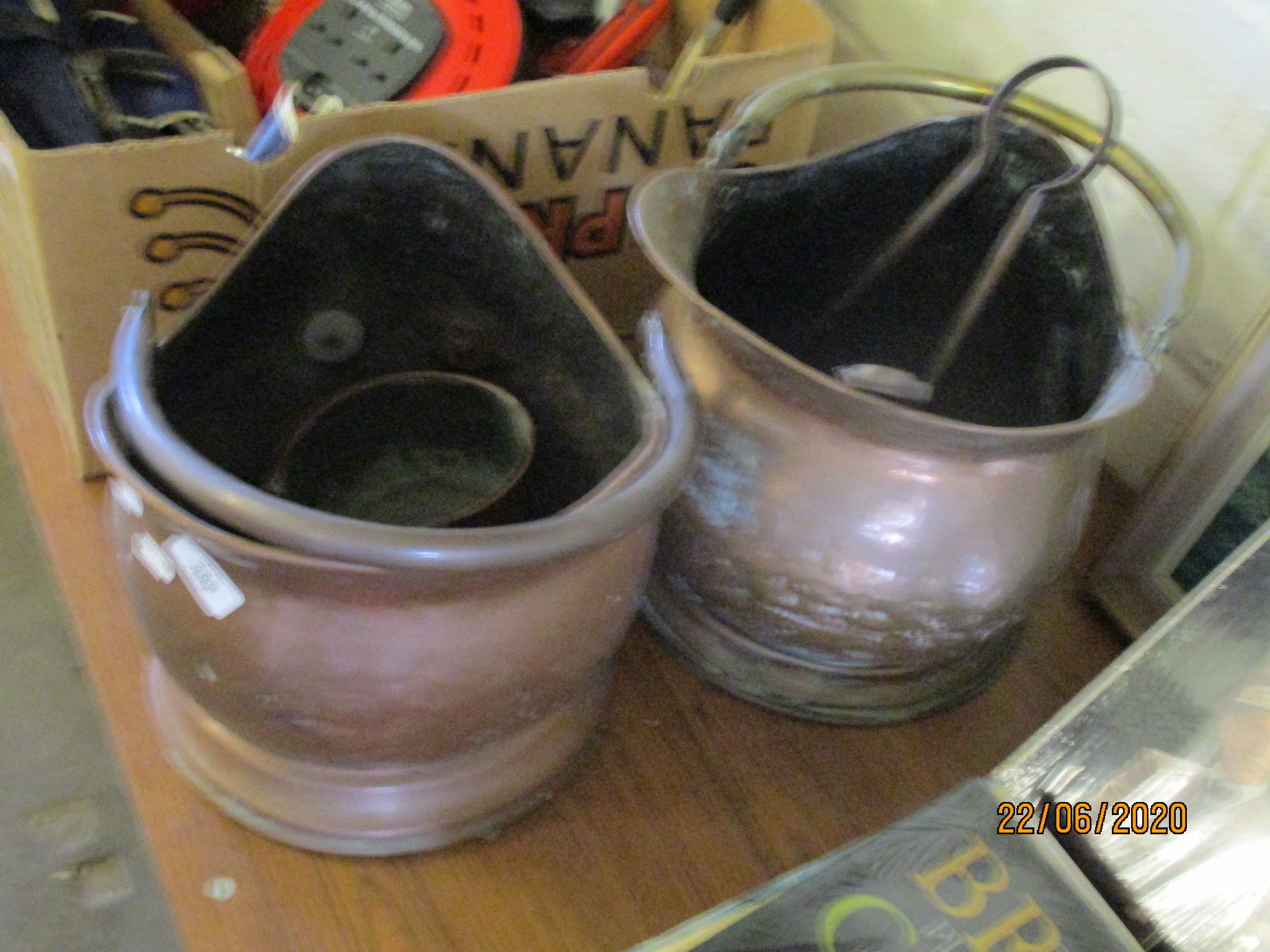 TWO VINTAGE COAL SCUTTLES TOGETHER WITH FIRE IRONS AND A SMALL COPPER SAUCEPAN