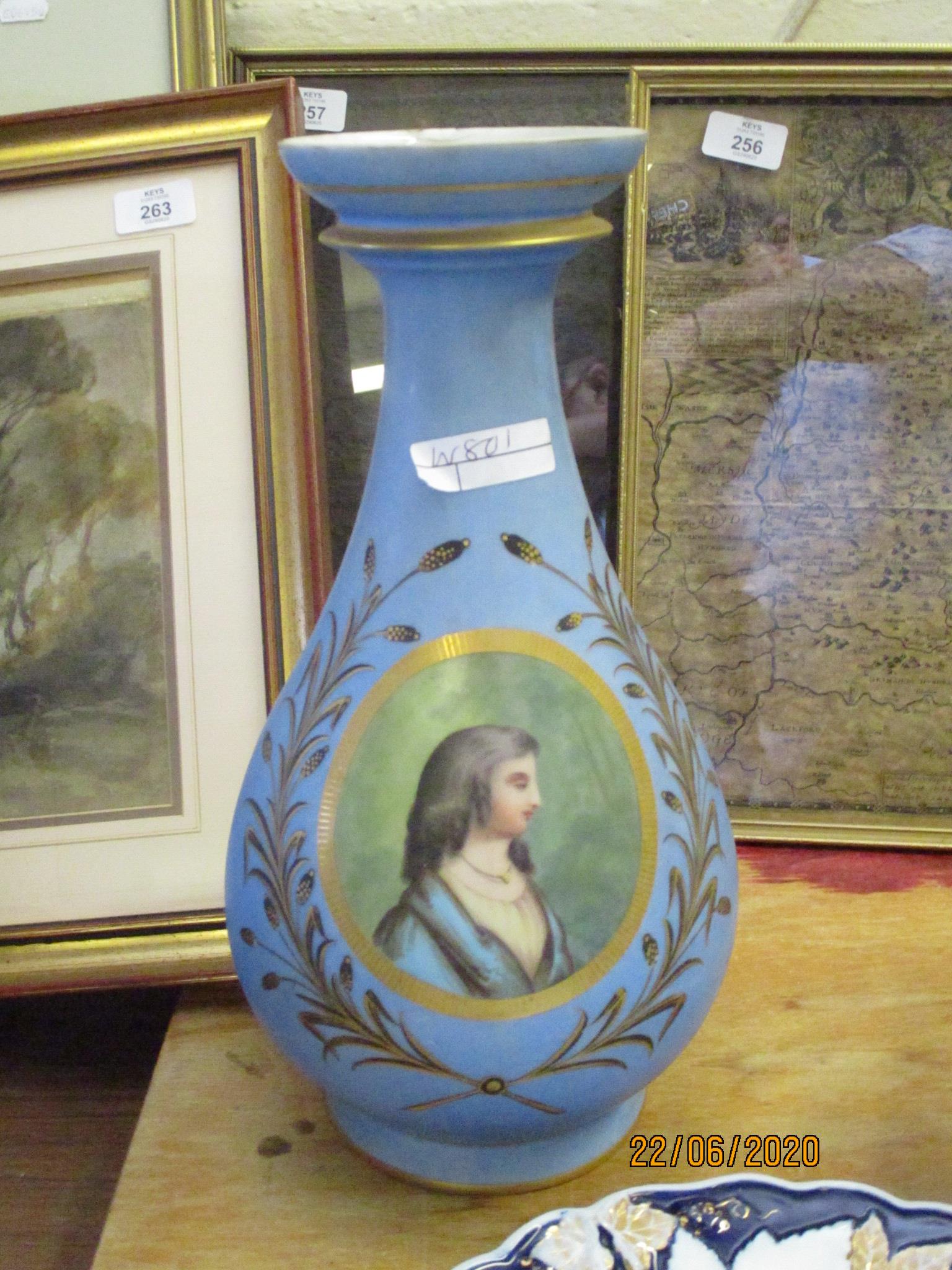 PARIS PORCELAIN STYLE BALUSTER VASE THE BLUE GROUND WITH A PANEL OF LADY PAINTED ON GREEN SURROUNDED