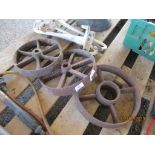 THREE CAST IRON WHEELS