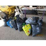 ELEVEN VARIOUS SACKS CONTAINING COAL