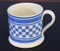 English pottery mug with blue chequered design