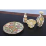 Group of Cantonese wares decorated in famille rose style, comprising a plate, two vases and a bowl