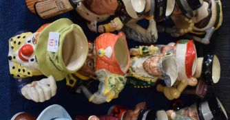 Group of four large Royal Doulton character jugs and a Kirkham Pottery jug including The Clown,