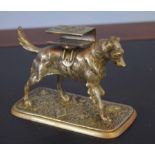 Unusual brass or formerly silver plated match case holder in the form of a dog, 10cm high