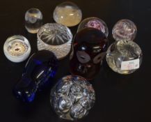 Group of 10 paperweights including a Caithness miniature ladybird and an Edinburgh Crystal weight (