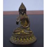 Bronze model of a Buddha