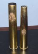 Two vintage shell cases, one applied with badge for The Royal Tank Regiment, the other the arms of