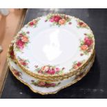 Collection of Royal Albert Country Roses sandwich plates and dish including six plates and a serving
