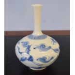 Japanese porcelain vase with blue and white design of herons amongst clouds, 15cm high