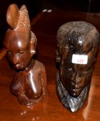 Two African hardwood busts, 23cm and 30cm high (2)