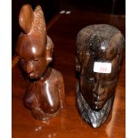 Two African hardwood busts, 23cm and 30cm high (2)