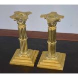 Pair of late 19th/early 20th century brass candlesticks with Corinthian column stems and stepped