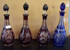 Group of four Bohemian style decanters, with faceted stoppers, tallest 39cm (4)