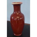Chinese porcelain sang de beouf vase, large baluster form with a typical red glaze, 60cm high