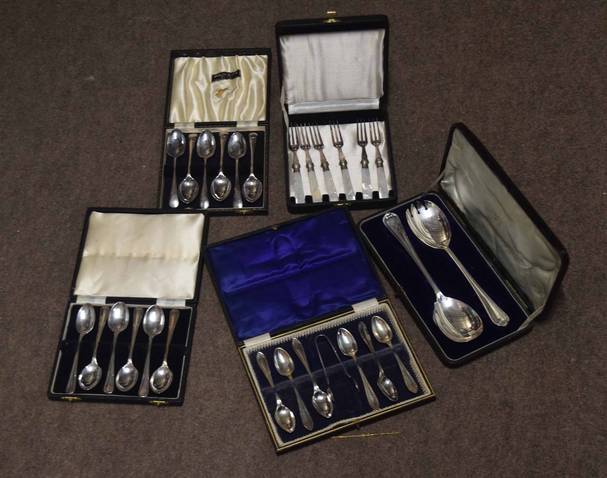 Collection of five various cased sets of silver plated cutlery including tea spoons, serving spoons,