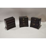 Collection of three Oriental ebonised small chests