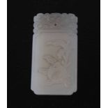Small rectangular piece of jade with floral carving, 5cm long