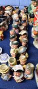 Extensive collection of Royal Doulton Doultonville small Toby jugs, (22)