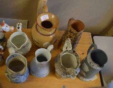 Group of seven pottery jugs including a Doulton Lambeth jug made for The Anchor Brewery with