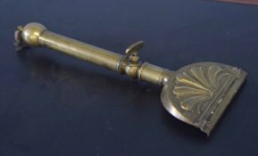 Unusual brass grooming tool, 34cm long