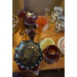 Extensive collection of carnival glass including bowls and vases and lampshade