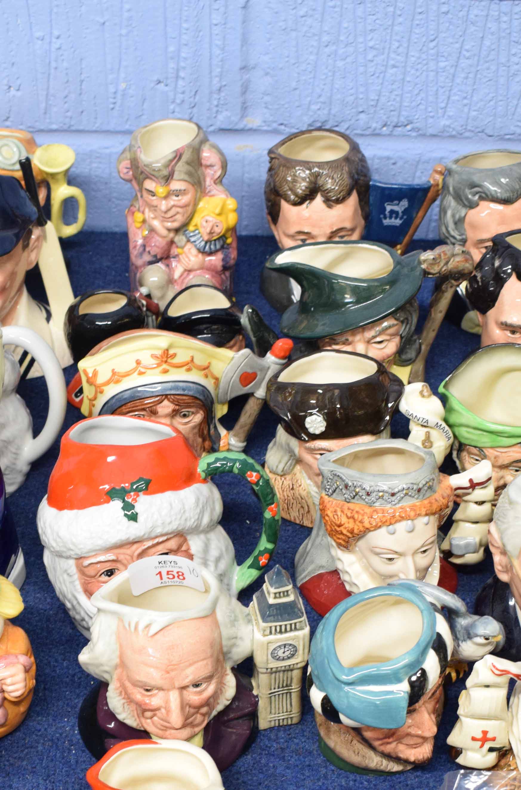 Group of Royal Doulton small and miniature Toby jugs including Father Christmas, John Doulton, The