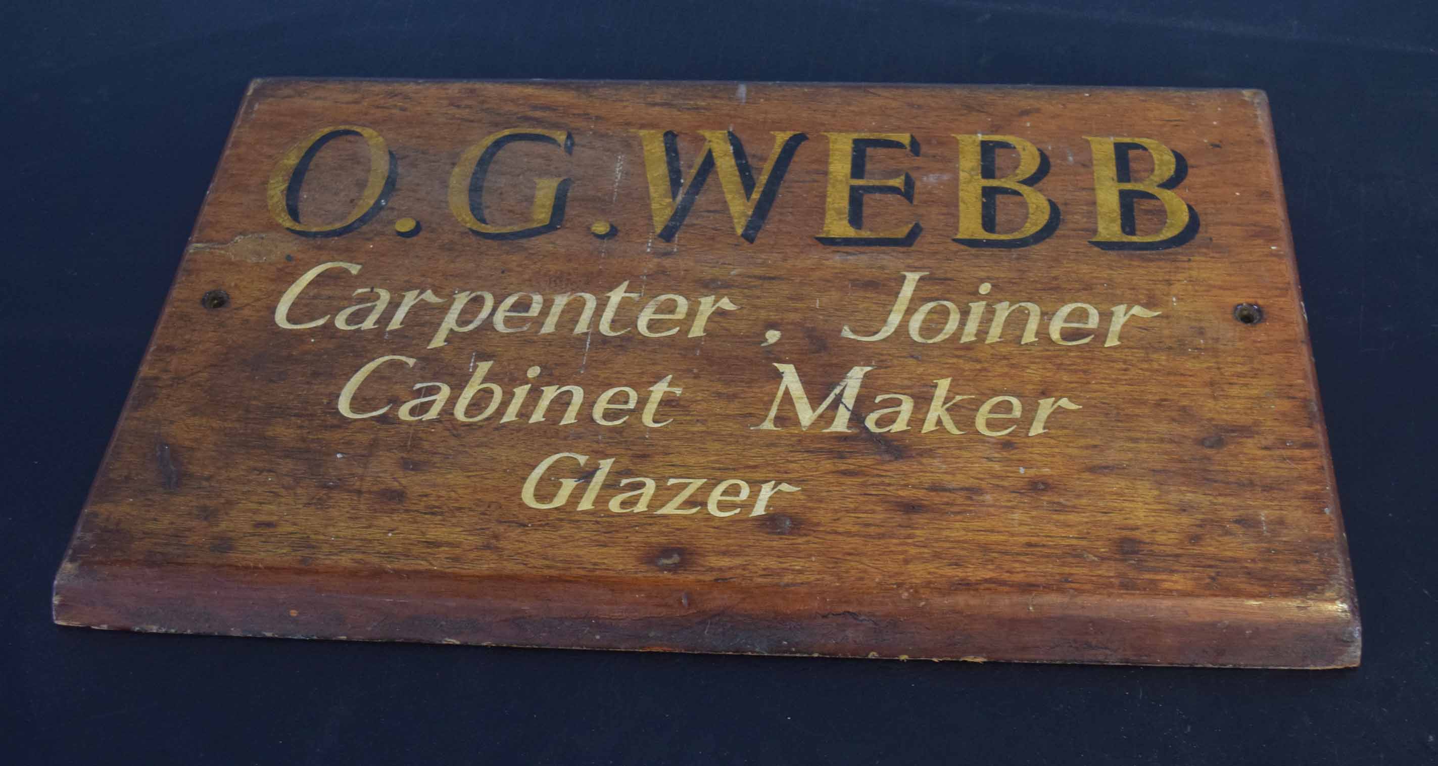 Vintage sign "O G Webb, Carpenter, Joiner, Cabinet maker and glazer", 44cm wide