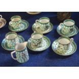 Part Chinese porcelain tea set decorated with a famille vert design, comprising six cups and saucers