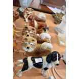 Group of six ceramic dogs including a spaniel and a collie (6)