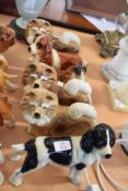 Group of six ceramic dogs including a spaniel and a collie (6)