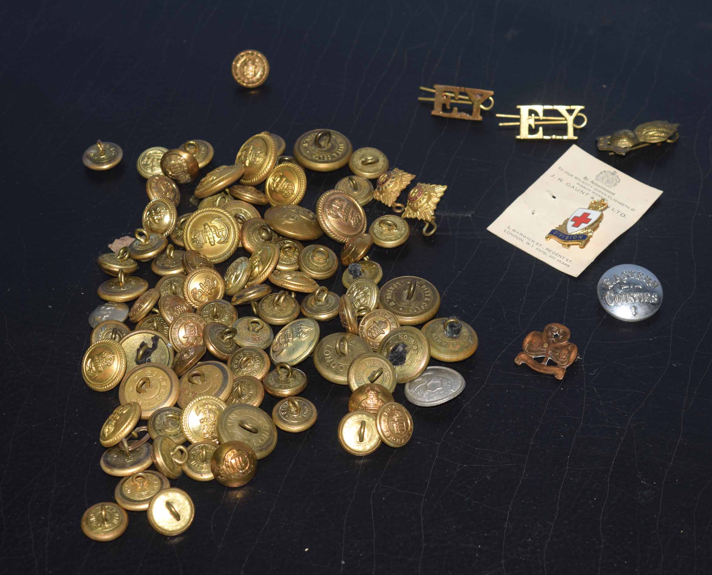 Box of various vintage military buttons