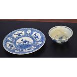 Chinese porcelain bowl decorated with warriors and immortals in various pursuits, the centre