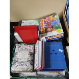 Tray containing modern jigsaw puzzles, hardback books etc