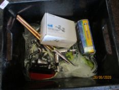 Box containing modern taps