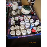 Two trays containing modern mugs and china wares