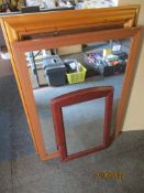 Three modern wooden framed mirrors