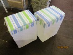 Pair of modern white laundry baskets