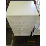 White finished three drawer bedside cabinet