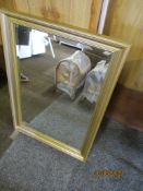 Gilt framed bevelled wall hanging mirror