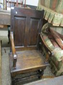 19TH CENTURY OAK WAINSCOT TYPE ARMCHAIR WITH PANEL BACK AND SOLID SEAT