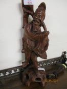 ORIENTAL CARVED FIGURE