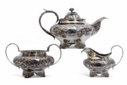 William IV three piece silver tea service comprising tea pot with hinged lid, a flower bud finial