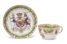 An important early 19th century English porcelain cup and saucer, probably Coalport, decorated